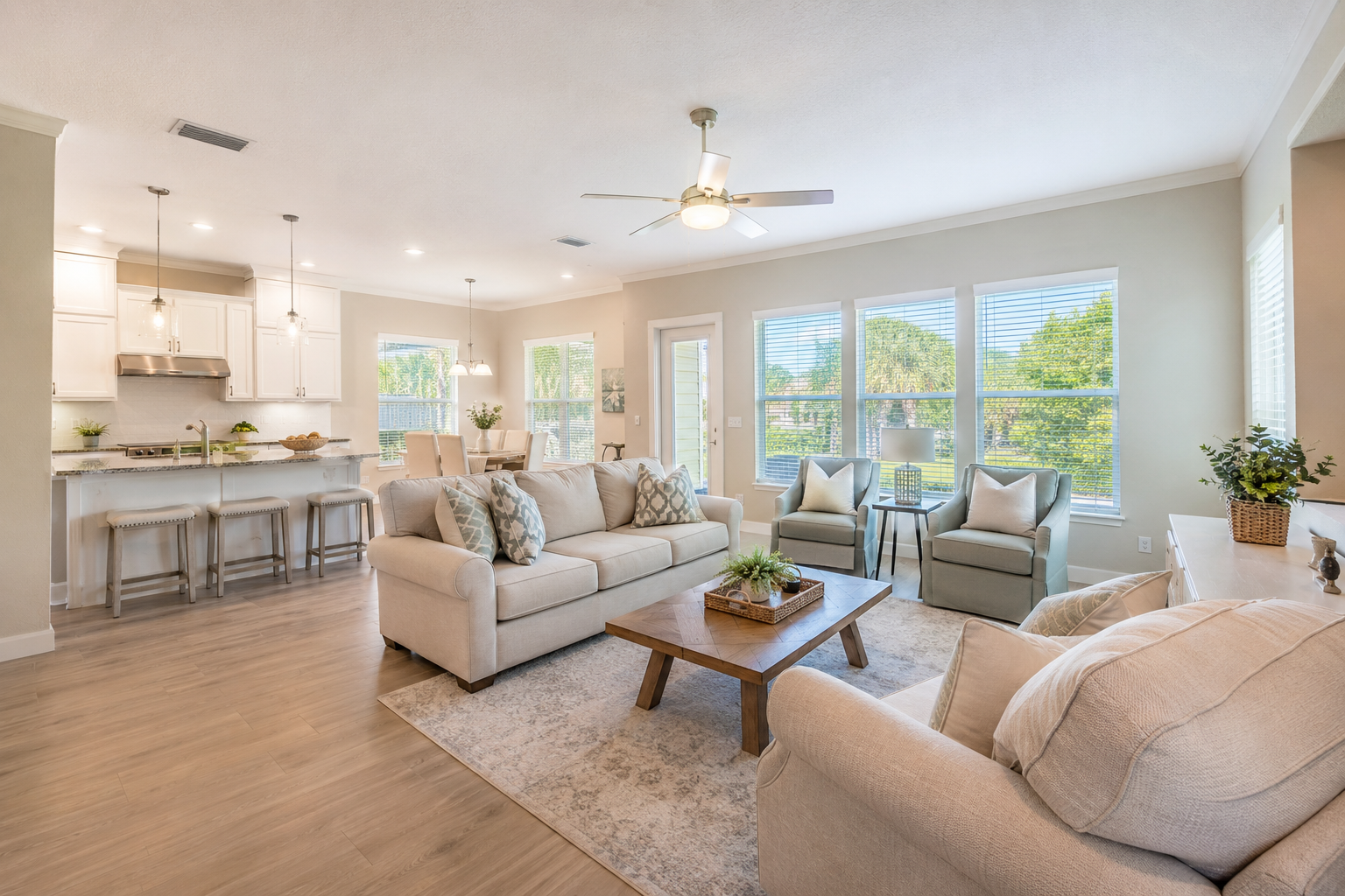 Demonstration real-estate interior photograph of an open living area and kitchen